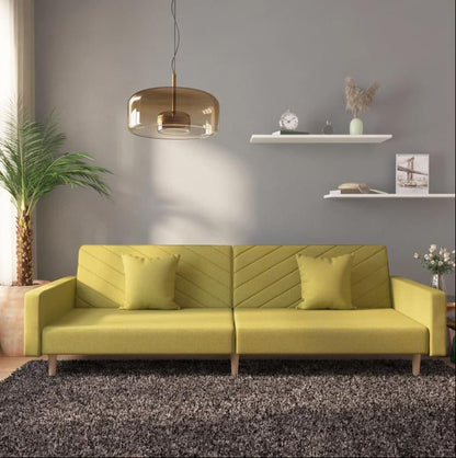 2-seater sofa bed with two pillows, green fabric