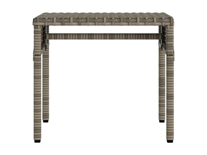 Chaise longue with canopy and grey woven resin table