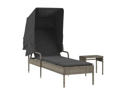 Chaise longue with canopy and grey woven resin table