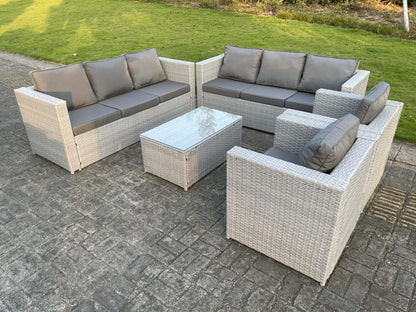 8-seater rattan garden furniture set, including a 3-seater sofa, 2 armchairs, and a coffee table in light grey.